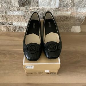 Michael Kors black Fulton moccasin.